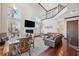 Open dining area with wood table and access to living room at 5287 Tuna Ln, Weeki Wachee, FL 34607