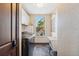 Convenient laundry room with washer, dryer, and extra storage at 5287 Tuna Ln, Weeki Wachee, FL 34607