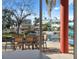 Waterfront patio with table and chairs, offering scenic views at 5287 Tuna Ln, Weeki Wachee, FL 34607