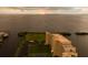 Aerial view of waterfront condo building at sunset at 5915 Sea Ranch Dr # 501, Hudson, FL 34667
