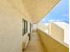 Covered balcony with tiled floor and sliding glass door at 5915 Sea Ranch Dr # 501, Hudson, FL 34667