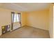 Simple bedroom with neutral walls and carpeted floor at 5915 Sea Ranch Dr # 501, Hudson, FL 34667