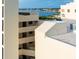 View of building exterior and waterfront at 5915 Sea Ranch Dr # 501, Hudson, FL 34667