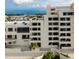 Building exterior showcasing balconies and water views at 5915 Sea Ranch Dr # 501, Hudson, FL 34667