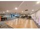 Large community room with dance floor and seating at 5915 Sea Ranch Dr # 501, Hudson, FL 34667