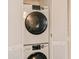Stackable washer and dryer in a closet at 5915 Sea Ranch Dr # 501, Hudson, FL 34667