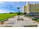 Outdoor seating area with string lights, perfect for relaxing at 5915 Sea Ranch Dr # 501, Hudson, FL 34667