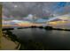 Stunning sunset over calm waters with cloudy sky at 5915 Sea Ranch Dr # 501, Hudson, FL 34667