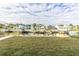 Grass lawn and waterfront view at 5925 Seaside Dr, New Port Richey, FL 34652