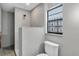 Bathroom featuring a walk-in shower and tile flooring at 5925 Seaside Dr, New Port Richey, FL 34652