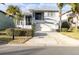 Beautiful home with 2-car garage, lush landscaping, and a charming curb appeal at 5925 Seaside Dr, New Port Richey, FL 34652