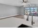 Spacious living room with water views and sliding glass doors at 5925 Seaside Dr, New Port Richey, FL 34652