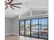 Living area with sliding doors leading to a relaxing patio at 5925 Seaside Dr, New Port Richey, FL 34652