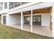 Ground level patio with access to backyard at 5925 Seaside Dr, New Port Richey, FL 34652