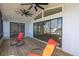 Spacious screened porch with water views and ceiling fan at 5925 Seaside Dr, New Port Richey, FL 34652
