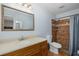 Bathroom with shower stall and updated vanity at 6166 Newmark St, Spring Hill, FL 34606