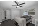 Bright bedroom with double bed and ceiling fan at 6166 Newmark St, Spring Hill, FL 34606
