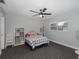 Bedroom with a bed, storage, and ceiling fan at 6166 Newmark St, Spring Hill, FL 34606