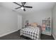 Bedroom with a bed, storage, and ceiling fan at 6166 Newmark St, Spring Hill, FL 34606