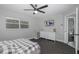 Bedroom with dresser and ceiling fan at 6166 Newmark St, Spring Hill, FL 34606