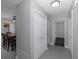 Bright hallway with built-in storage and view of dining area at 6166 Newmark St, Spring Hill, FL 34606