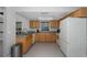Bright kitchen with light wood cabinets and ample counter space at 6166 Newmark St, Spring Hill, FL 34606