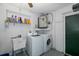 Laundry room with washer, dryer, and utility sink at 6166 Newmark St, Spring Hill, FL 34606