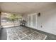 Spacious screened porch with grill and backyard view at 6166 Newmark St, Spring Hill, FL 34606