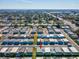 Aerial view of the property and surrounding homes at 7037 Versailles N # 15, Pinellas Park, FL 33781