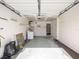 Garage with washer, dryer, and additional storage at 7037 Versailles N # 15, Pinellas Park, FL 33781