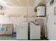 Garage laundry area with washer and dryer hookups at 7037 Versailles N # 15, Pinellas Park, FL 33781