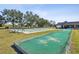 Well-maintained shuffleboard courts in a community setting at 7037 Versailles N # 15, Pinellas Park, FL 33781