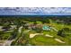Community clubhouse, pool, and golf course aerial view at 7267 Prince George Ct, Spring Hill, FL 34606