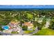 Large community view including clubhouse, tennis, and golf at 7267 Prince George Ct, Spring Hill, FL 34606