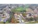 Aerial view showcasing home location near golf course at 7267 Prince George Ct, Spring Hill, FL 34606