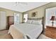 Spacious main bedroom with king-size bed and ample space at 7267 Prince George Ct, Spring Hill, FL 34606