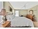 Main bedroom with king-size bed, nightstands and dresser at 7267 Prince George Ct, Spring Hill, FL 34606