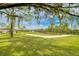Scenic golf course view with lush green fairways and sand traps at 7267 Prince George Ct, Spring Hill, FL 34606