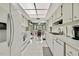 Clean and bright kitchen with white appliances at 7267 Prince George Ct, Spring Hill, FL 34606
