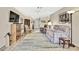 Open living space with hardwood floors and comfy seating at 7267 Prince George Ct, Spring Hill, FL 34606