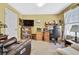 Home office featuring a desk, chair, and built-in shelving at 7267 Prince George Ct, Spring Hill, FL 34606