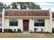 Condo with brown roof and a red holiday decoration at 8210 Sulky Ct # 5, Port Richey, FL 34668