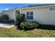 House exterior with walkway and landscaping at 8524 Corinthian Way, New Port Richey, FL 34654
