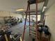 Spacious garage with ample storage shelving and space for two vehicles at 8524 Corinthian Way, New Port Richey, FL 34654