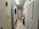 Convenient laundry room with washer, dryer, and extra storage at 8524 Corinthian Way, New Port Richey, FL 34654