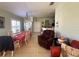 Living room with seating area and dining table at 8524 Corinthian Way, New Port Richey, FL 34654