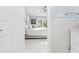 View of bedroom from bathroom entrance at 8711 Betty St, Port Richey, FL 34668