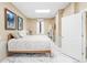 Spacious bedroom with king-size bed and marble flooring at 8711 Betty St, Port Richey, FL 34668