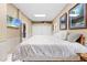 Large bedroom with king-size bed and flat-screen TV at 8711 Betty St, Port Richey, FL 34668