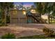 Two-story house with double garage and a brick driveway at 8711 Betty St, Port Richey, FL 34668